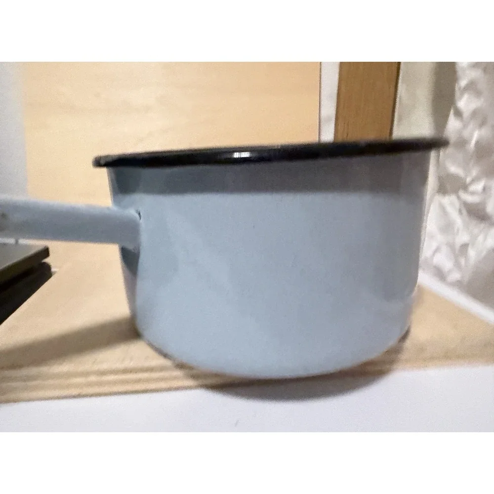 vintage light blue enamelware saucepan